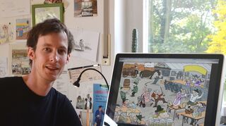 Der Cartoonist Hannes Mercker an seinem Arbeitsplatz.