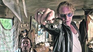 <p>Ben Becker greift zur Waffe: Szene aus dem deutschen Thriller "Das Kind" von Regisseur Zsolt Bács.</p>