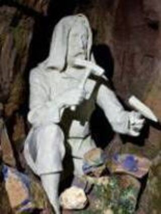 Harte Arbeit: Figur eines Knappen mit Schlägel und Eisen.