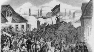 Historischer Stich der Barrikade 1848 an der Rheinbrücke.