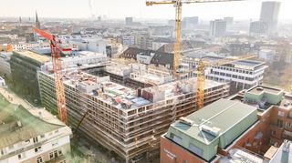 Menschen aus 60 Nationen arbeiten bei der Diringer & Scheidel-Gruppe. Hier die Baustelle des Projekts New Seven in der Mannheimer Innenstadt.
